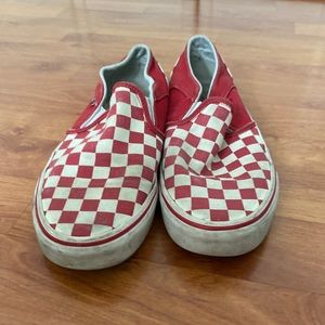 Checkered slip on red and white vans